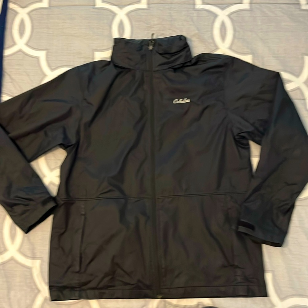 Lightly used, Cabelas,water,resistant,black,hide-able hood,medium,wind breaker.